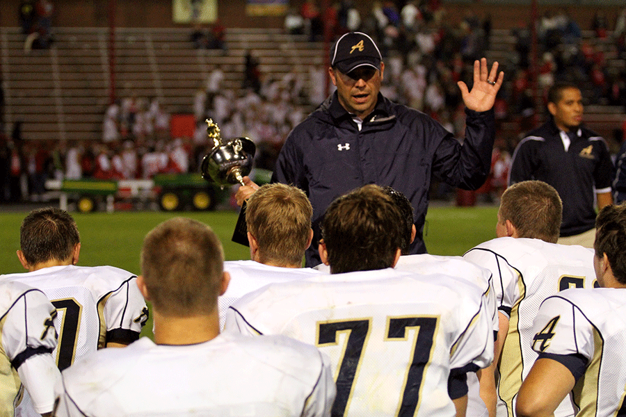 Coach Greg Dailer addresses the team after another Stilly Cup win in Stanwood Friday, September 20.