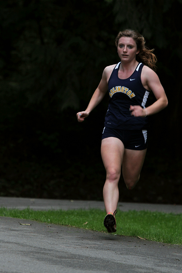 Junior Shanelle Shirey runs at the Cross Country meet at River Meadows on September 25.