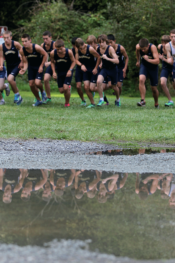 The boys Cross Country team racing at their only home meet this season.