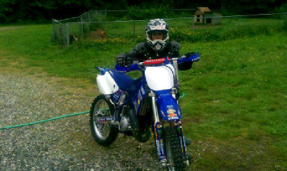 Jacob Olson, 10, with his new bike this summer.