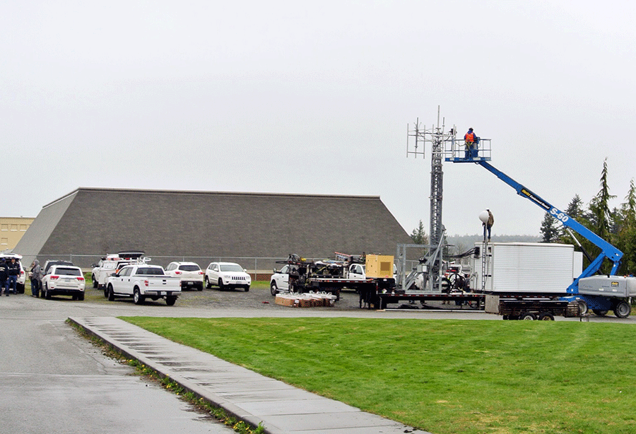 FEMA setting up command center and cell tower at Haller Middle School.