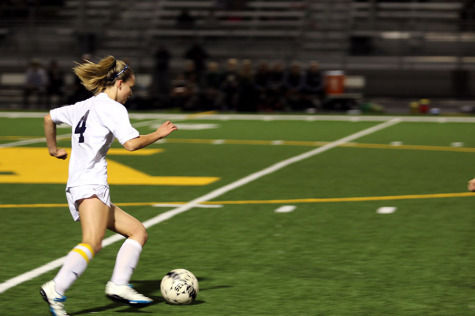 Senior Bre Morren receives the ball and pushes towards the MG goal to finish her hat trick.