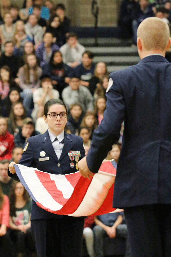 ROTC presents the folding of the flag during the Veterans Day Assembly 