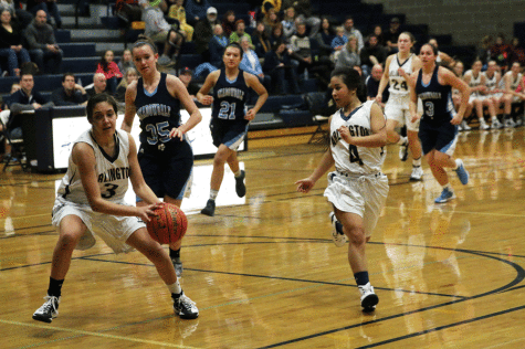 Gracie Castaneda (11) prepares for a shot while Serafina Balderas gets ready for a rebound (11) at the varsity girls basketball game on the 1st. 