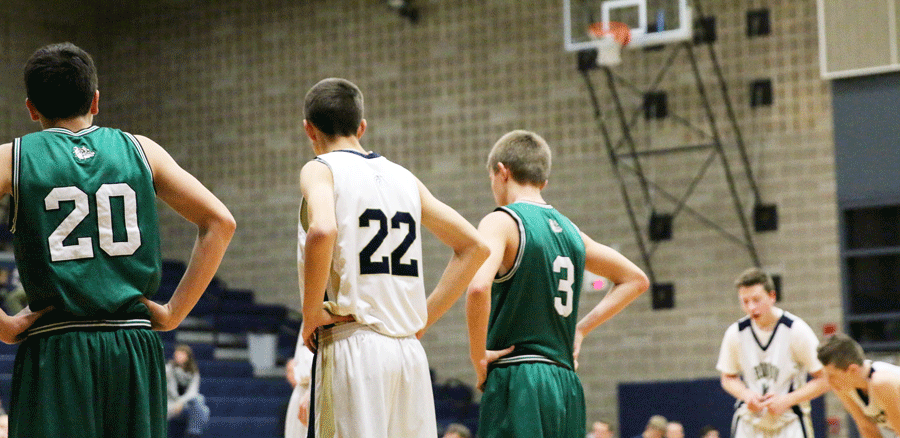 Tim+Zachman+%2811%29+prepares+to+rebound+before+a+free+throw+during+the+Arlington+High+School+JV+game