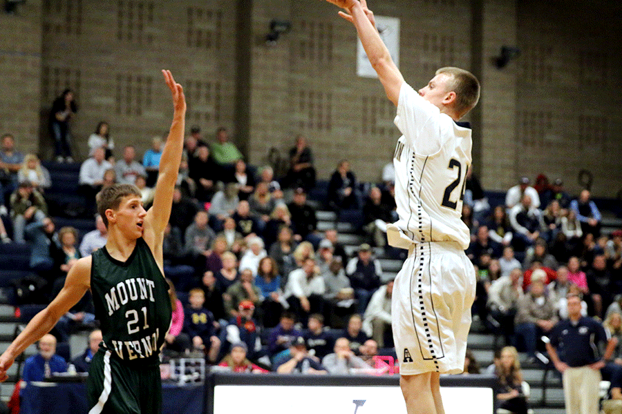 Drew Bryson (17) pulls up for a three during the Eagle’s game against Mount Vernon. 