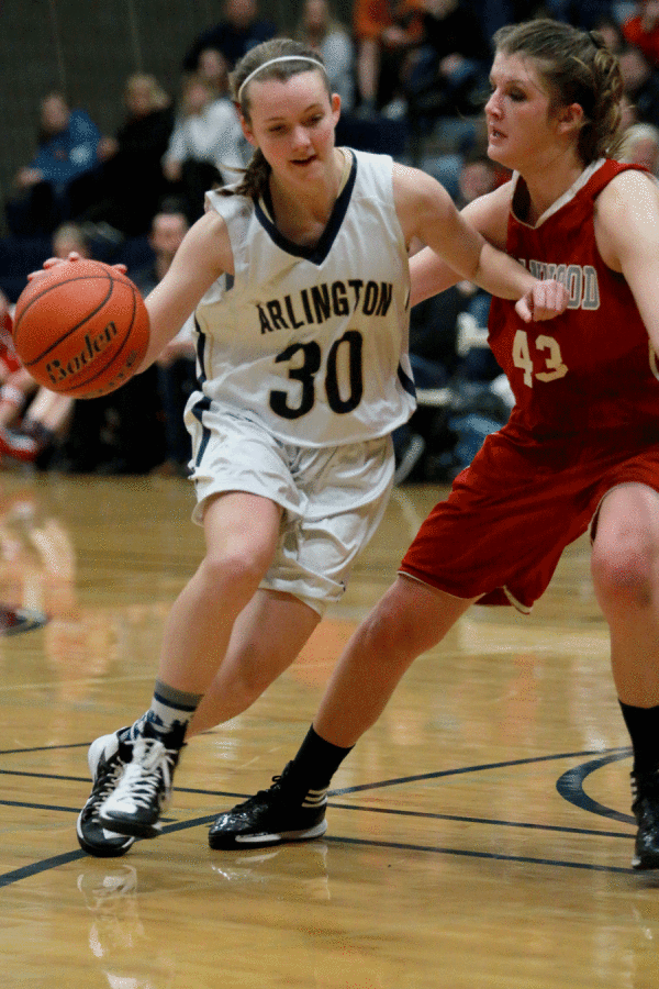 Abby Anderson dribbles down the court at the end of the game on Thursday, February 19th, 2015. 