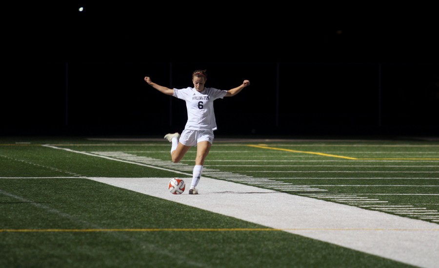 Arlingtons Channing Hudson (16) in mid-kick during a home game versus Bothell on September 15th. 