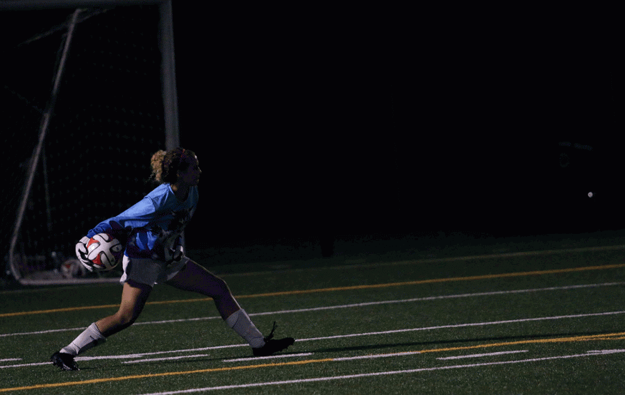 Senior goalkeeper Kat Sanchez throws the ball back onto the playing field after making a save. 