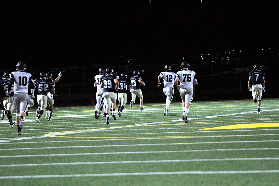 Senior Parker Spady (#23) recovered the fumble on Bonney Lakes opening drive and ran for a 97 yard touch down.