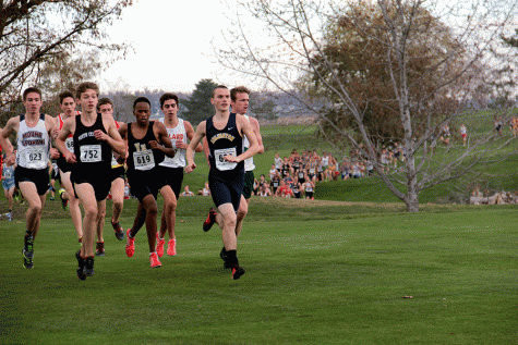 Nate Beamer (16) approaches the one mile mark of the race, leading the front pack of the 3A boys on November 7th.  He went on to finish 2nd in his race, running 15:18, the third fastest time of the entire day, all classifications.  