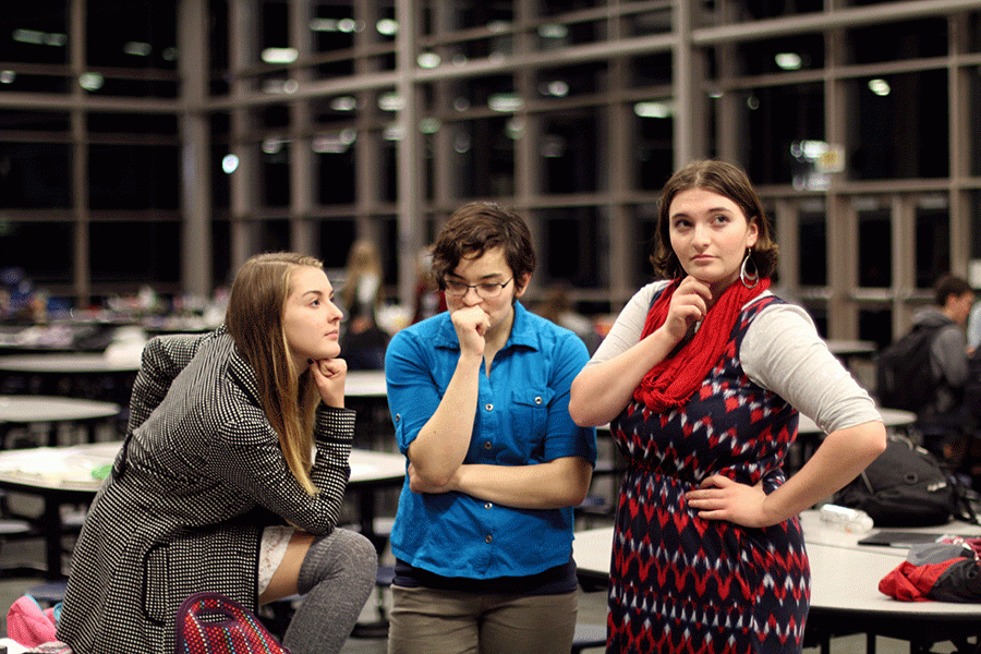 Hannah Martian, Lily Janda, and Aysia Brenner ponder how next to proceed prior to the second oral round at the Knowledge Bowl competition on November 17th.  