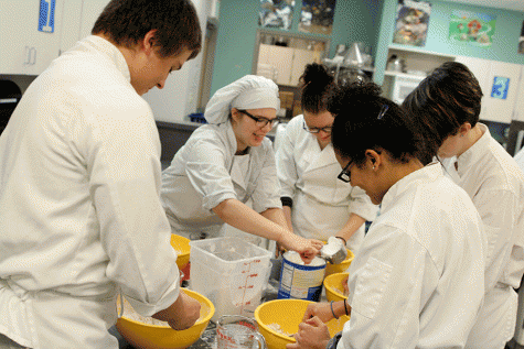 Students in Ms. Edwards' first period class makes pies, which will be sold as part of a fundraiser. 