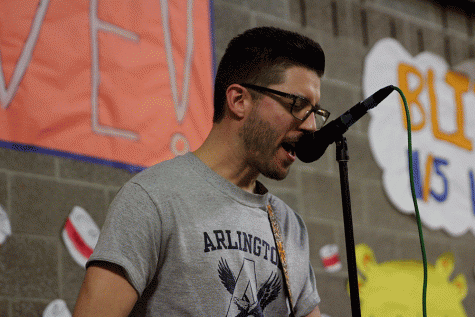 Mr. Ballew performs on stage during a fundraiser for the food drive at lunch on November 12th. 