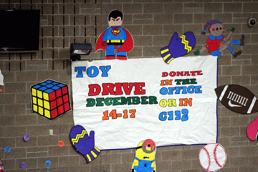 Pictured+above+is+the+toy+drive+poster+pinned+up+in+the+AHS+commons.++The+Respect+Club+organized+the+book+and+toy+drives+to+spread+the+giving+spirit.