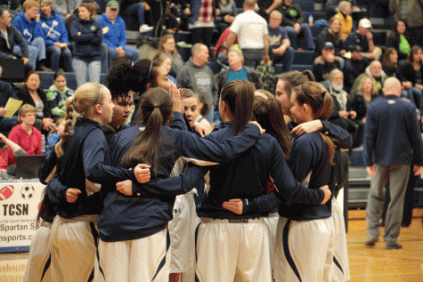 Jayla Russ ('16) leads the girls basketball team in a pre-game huddle prior to their game against Stanwood on January 15th.