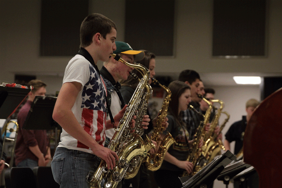 Zane Blanken (16), Nicholas Mendro (17), and Selena Gutierrez (16) practice during Jazz Band on January 12th.