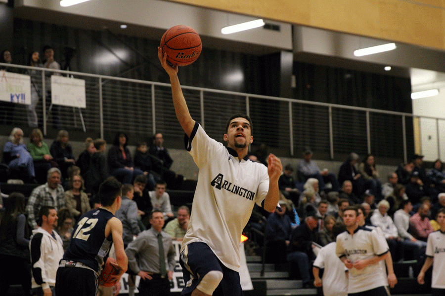 Donavan Sellgren (16) practices his layups prior to a game against Marysville-Getchell on February 8th. 