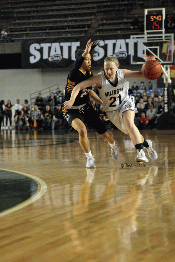Emma Janousek ('16) dribbles around a Bellevue defender during the State Championship game on March 5th.