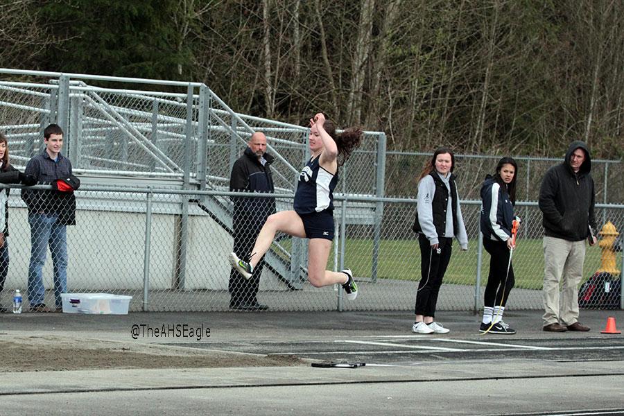 Mary Catherine Meno ('17) completes the long jump during a meet on March 24th. 