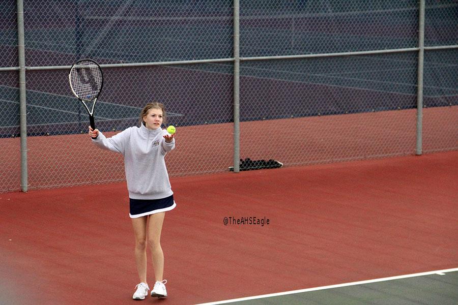 Faith Gould ('18) prepares to serve to her opponent during a match against Mountlake Terrace. 