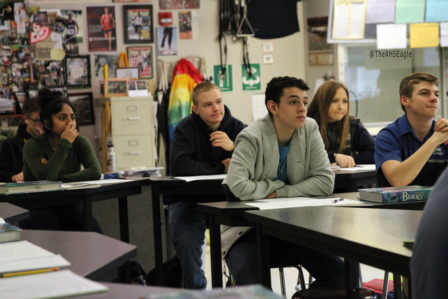 Students in Mr. Murrays sixth period biology class listen as Mr. Murray preforms a demonstration. 