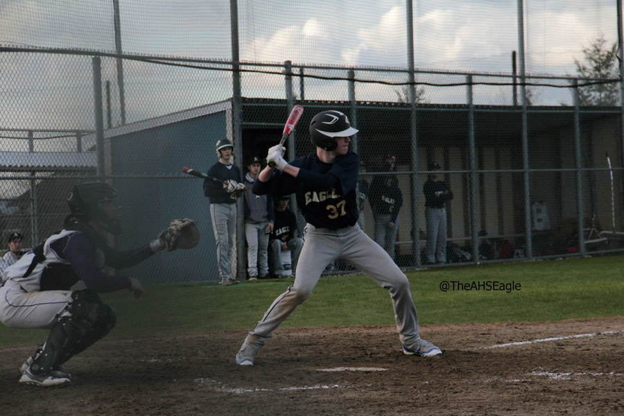 Cameron Smith (18) prepares to swing during a JV game on March 15th. 