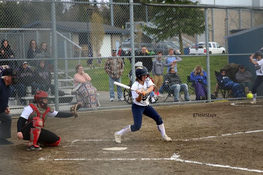 Shyne McKay (16) takes a swing during a softball game against Marysville-Pilchuck.