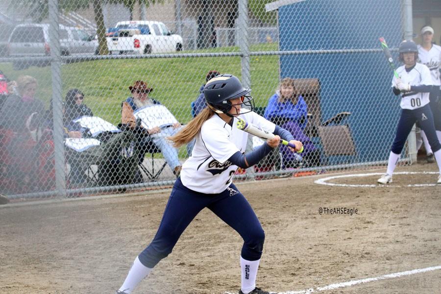 Alyssa Crain (16) puts down a bunt during a game on April 13th. The Eagles would go on to win the game against Lynwood, 9-4.