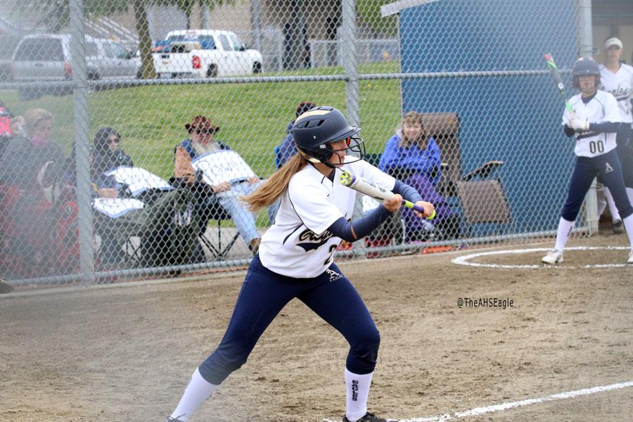 Alyssa Crain ('16) puts down a bunt during a game on April 13th. The Eagles would go on to win the game against Lynwood, 9-4.