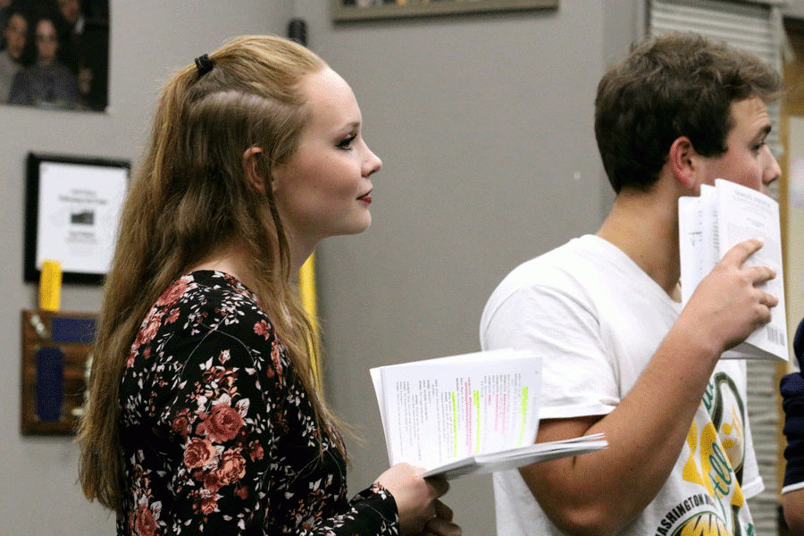 Hannah Jensen ('17) and Zeke Basher (18') listening to notes from Mr. Moberly during the fist week of Moon Over Buffalo rehearsals. Jensen is playing Charlotte Hay and Zeke is portraying a potential love interest, Richard.