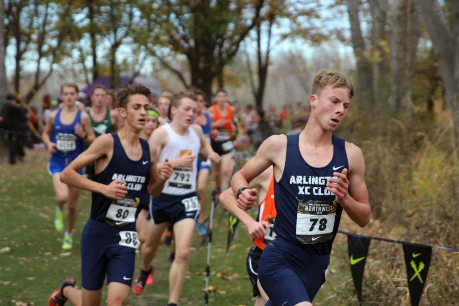 Cross+country+runners+Dawson+Andrews+%2818%29+and+Blake+Landry+%2819%29+compete+during+the+NXR+Northwest+Regionals+division+one+varsity+race+Saturday%2C+November+12+at+Eagle+Island+State+Park+in+Boise%2C+Idaho.+As+Arlingtons+second+runner%2C+Landry+went+on+to+finish+with+a+time+of+17%3A03%2C+shortly+followed+by+Andrews%2C+who+ran+a+17%3A06+5k.+