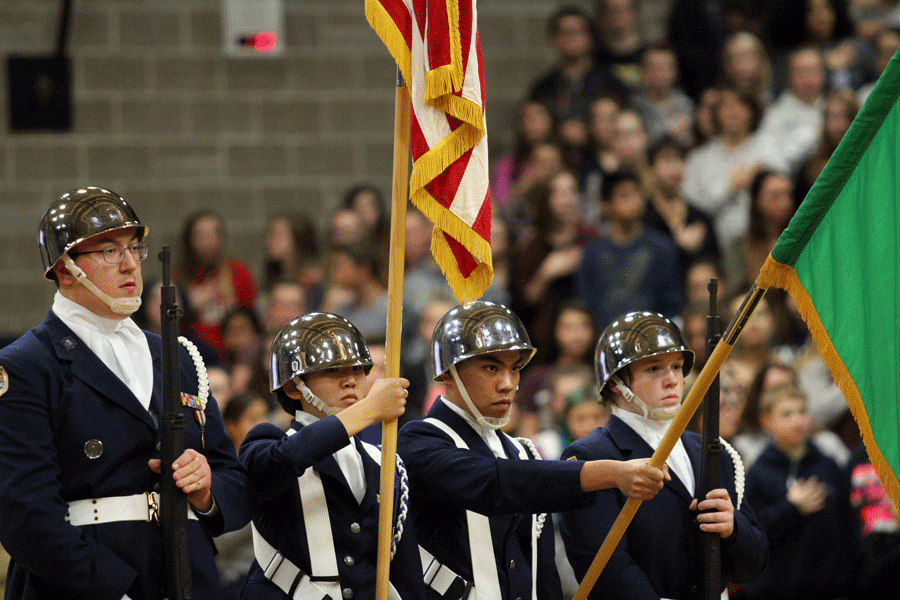 The+JROTC+members+present+the+flags+at+the+veterans+day+assembly+on+Wednesday.