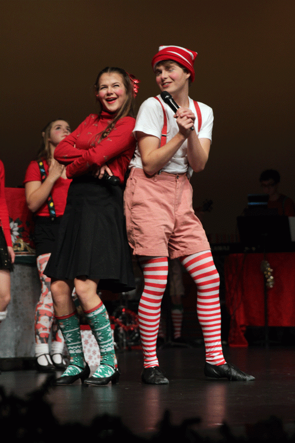 Casey Sharpe ('17) and Madison Schimpf ('17) get cozy during Flights rendition of "Cool Yule".