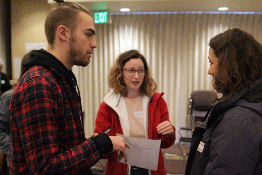 Senior ecology club members Colin Watts and Nadine Christensen explain the information they learned from their previous session at the Youth Earth Summit at Padilla Bay Reserve on Friday, January 6th. 