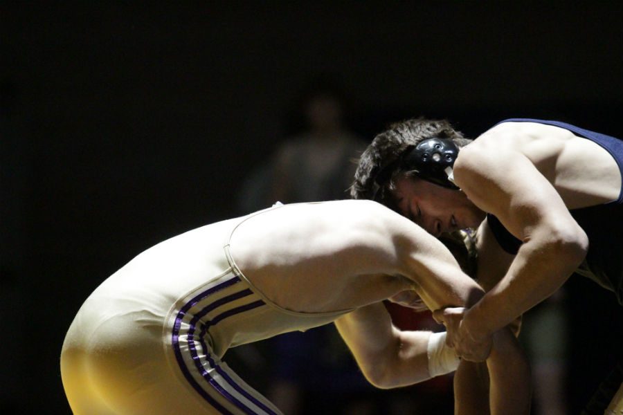 Sophomore wrestler Cole Hahn battles against Oak Harbor at weight class 160 on January 12. 
