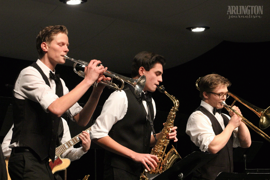 Dean Shepherd (18), Johnathon Leon-Guerrero (18), and Devon Nutter (17) take the stage as the first performance of Jazz night.