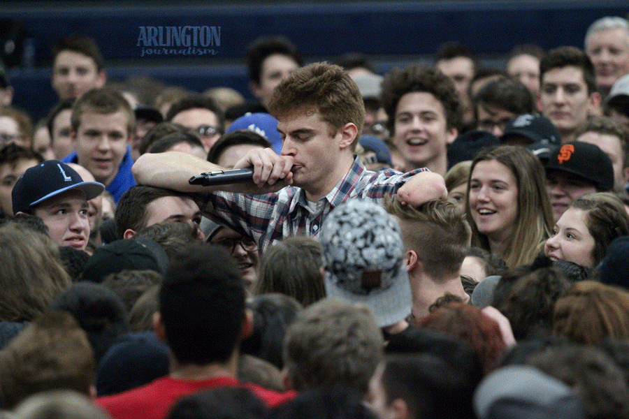 Motivational speaker, Kevin Laue, invites everyone in for a group hug during the assembly. 