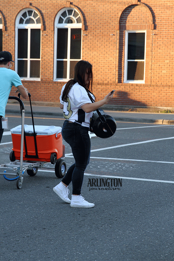 Senior Hannah Balcos was tasked with the job of carrying the music down the LipDub route. 