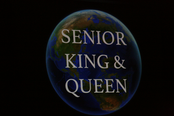 The slide before the anticipation on the winners of the senior class king and queen.