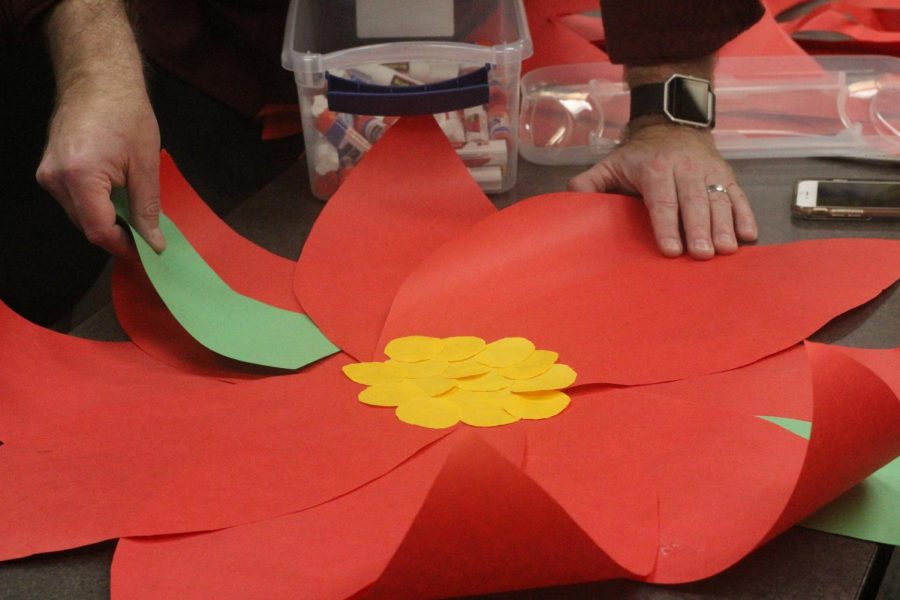 In preparation for Christmas, Spanish club is putting together wall decorations for the B wing. Even though her knowledge of poinsettias was questioned by Jaime Breisch, Missi Christoferson (‘18) constructed one that inspired Señor Duskin to experiment with the placing of the leaves. 

