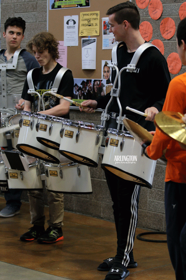 Jack Hamilton (19)  plays the drums at the send-off for the state wrestlers. 