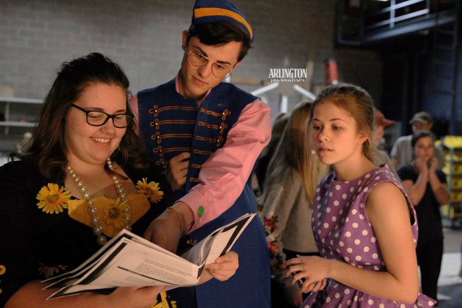 Julia Cameron ('18), Alec Villa ('20), and Hannah Glunt ('18) go over lines for this spring's musical