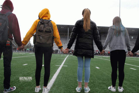 At the walkout held on March 14th a month after the Parkland shooting, AHS hold hands in silence to honor those who lost their lives.