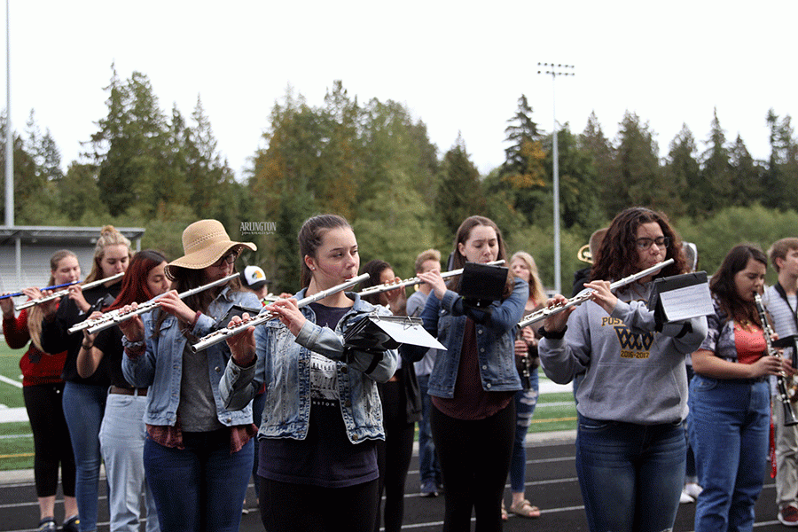 Fifth period Symphonic Band prepares for the halftime show at Homecoming.