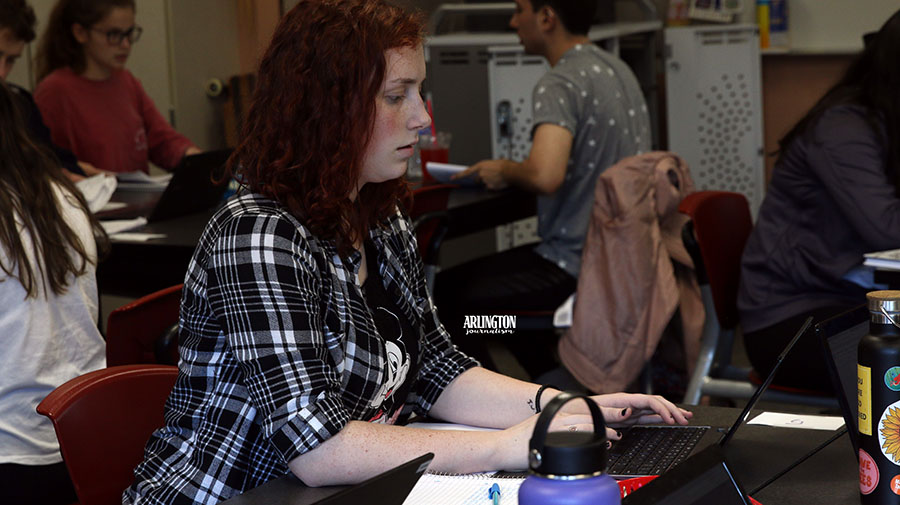 Katheryn Stevenson ('12) works on an article assignment for College Writing. She's in Mrs. Smithson's only fifth period College Writing class.