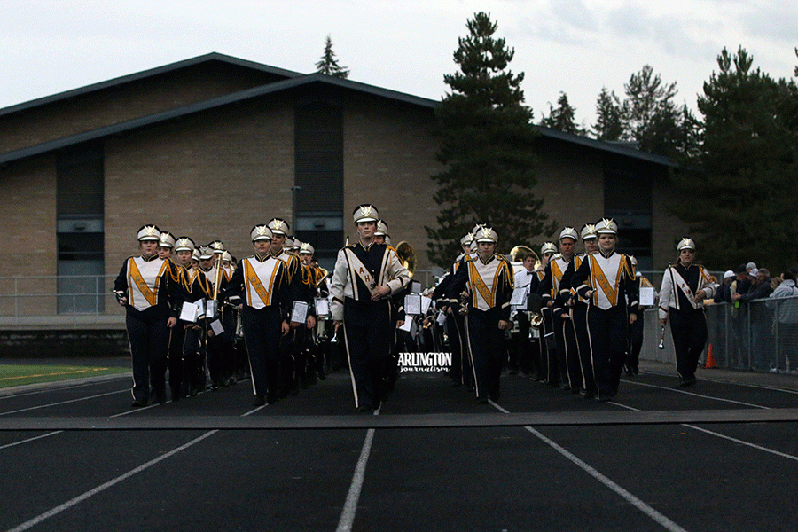 The AHS band marches around the track before they play the Star Spangled Banner at the Stilly Cup on September 14, 2018.