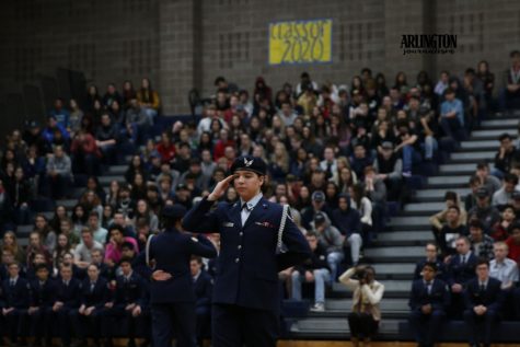 Samrie Feria(11) and partner Areanna Schuerman(11) show off there duel routine at the Veterans Day Assembly.
