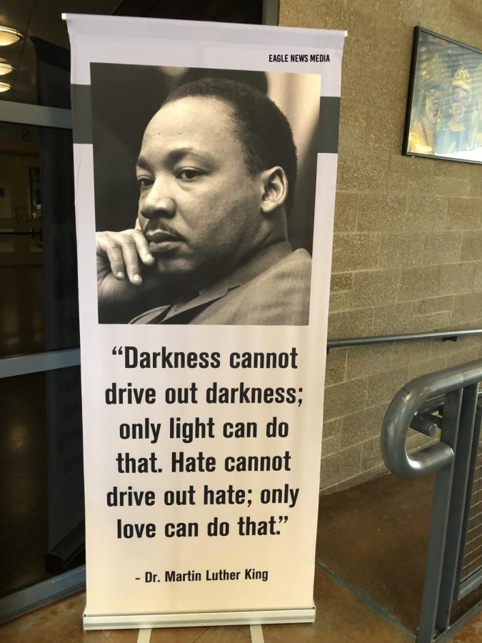 A poster of MLK with his quote, Darkness cannot drive out darkenss; only light can do that. Hate cannot drive out hate; only love can do that is displayed in the commons.