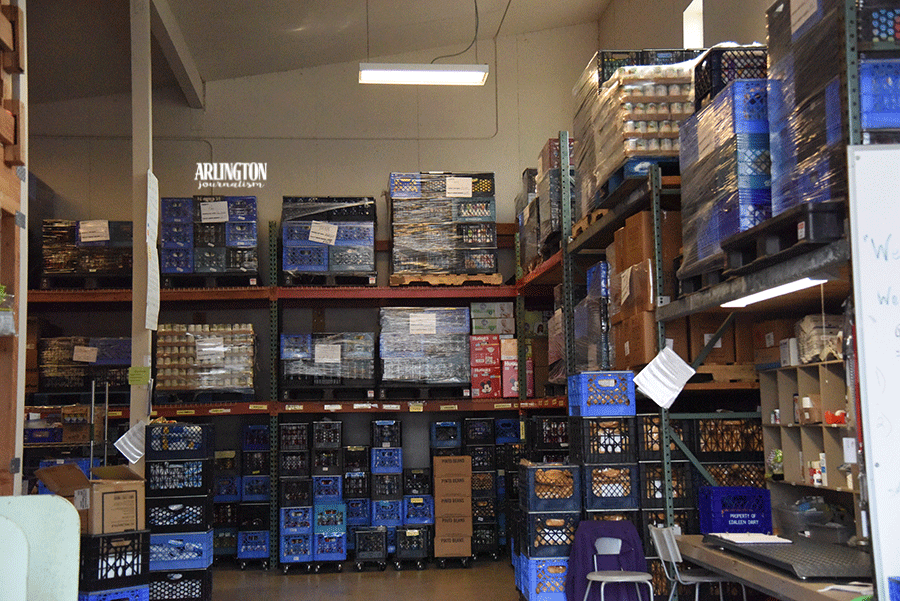 A stack of boxes and crates at the Arlington Community Food Bank.